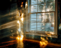 2026-08-05 AI - Light through a water-soaked window