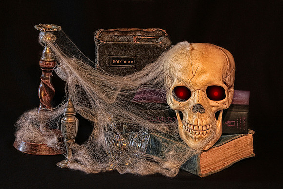 Yorick In The Library With A Candlestick