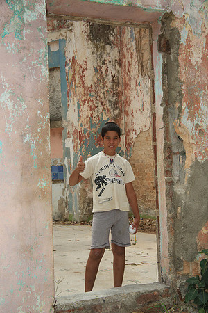 Abandoned Sugar Cane Mill and Boy