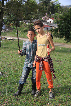 Two Boys with Machettes